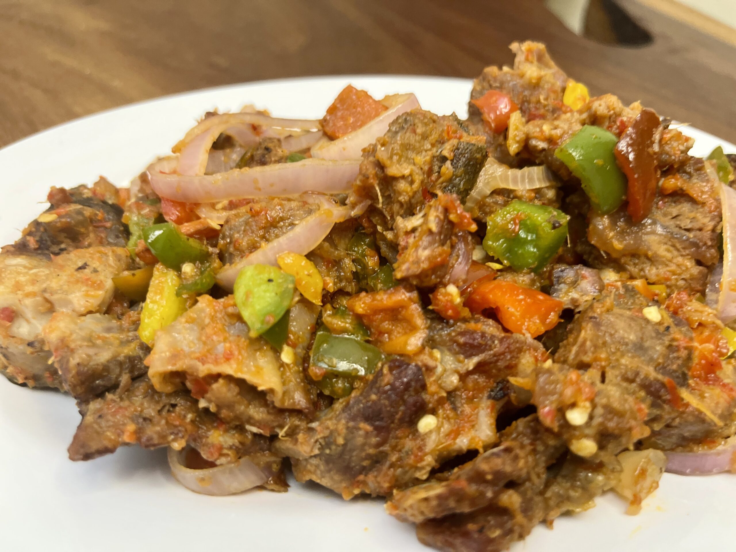 How to Make Asun Spicy Peppered Goat Meat Recipe